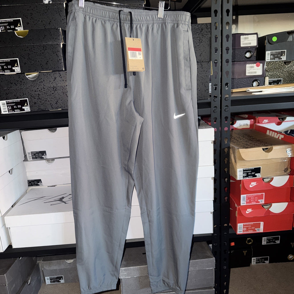NWOT Nike Dri-FIT Challenger Mens Sz L Woven Running Pants Smoke Grey 0115-0116